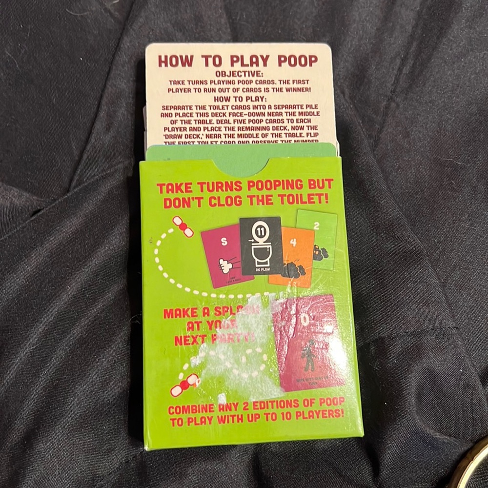Poop card game like new has some of the adhesive on box from price.